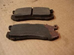 Worn brake pad causing grinding noise