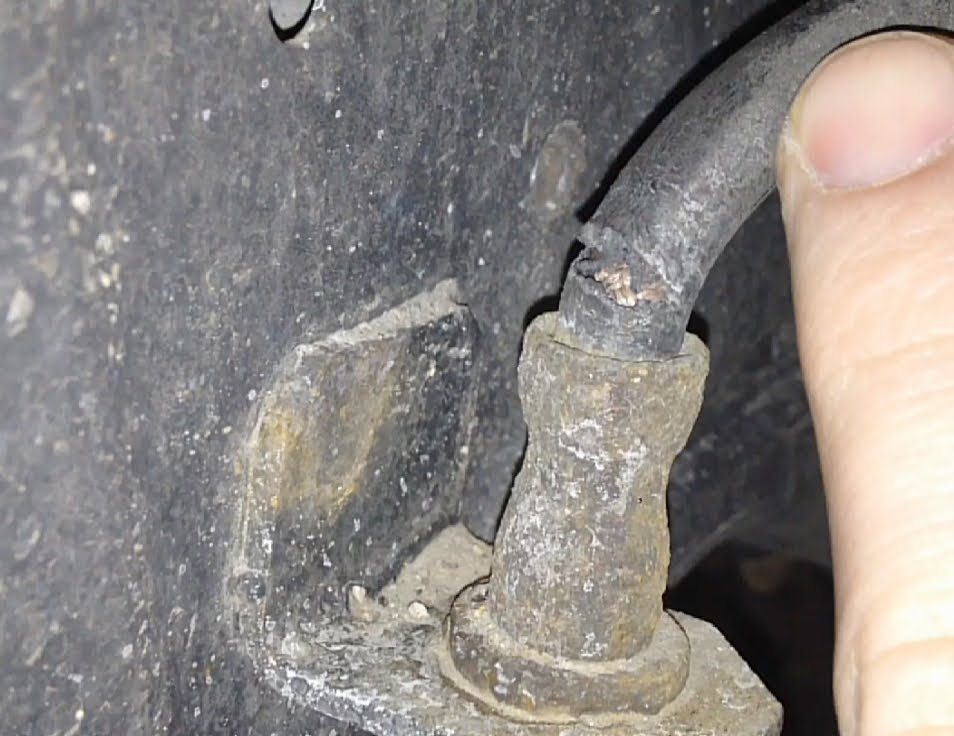 Cracked perished brake hose needing replacement