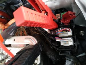 Red and black jumper cable joined