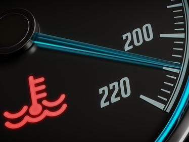 Engine temperature warning light on the dashboard
