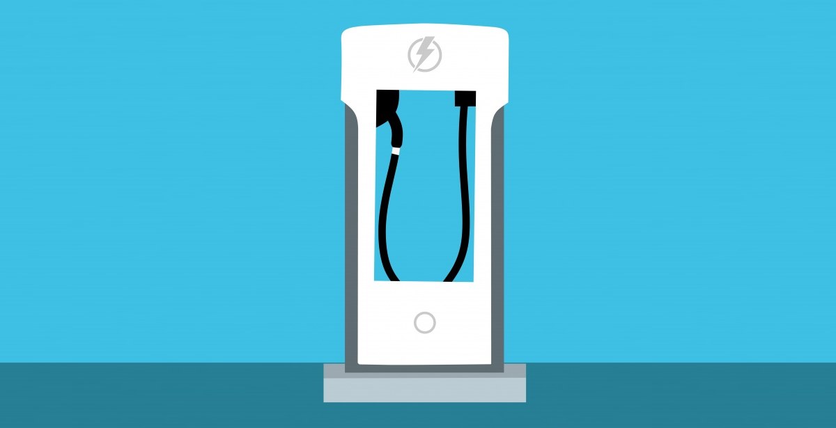 electric-charger-1 Electric vehicle charger plugged into a car
