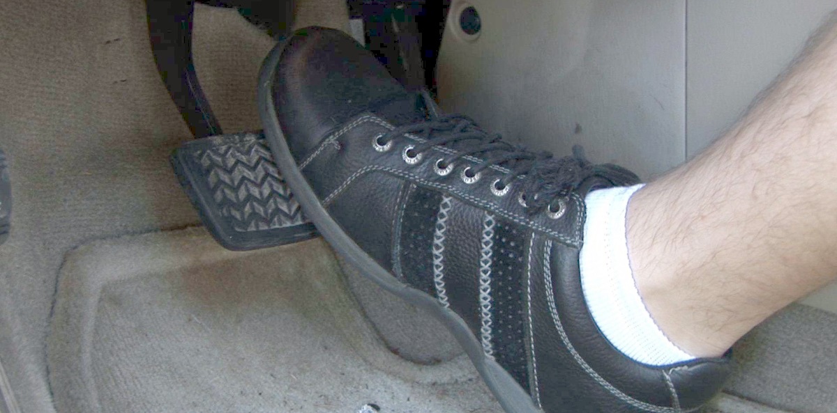 brake-pedal Driver pressing a soft, spongy brake pedal