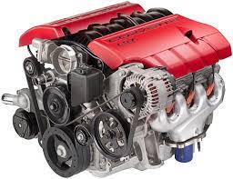 Red-covered V8 car engine under the bonnet