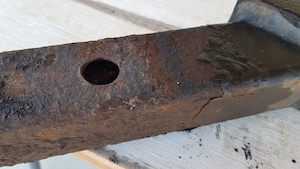 Rusty towbar that has failed a Warrant of Fitness