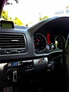 Apexi auto turbo timer installed on a car dashboard