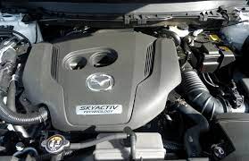 Mazda engine bay with the i-Stop system