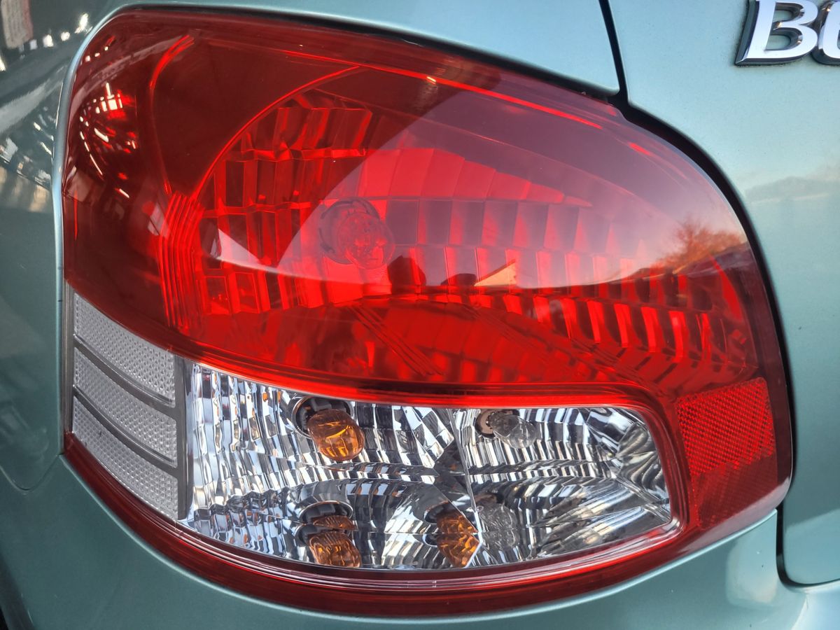 Car Brake Light Close-Up Close-up of a car's brake and tail light assembly.